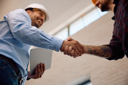 Shaking hands with Precision Machining Partner